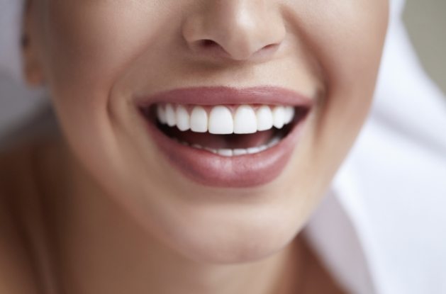 Close up of smile with straight white teeth