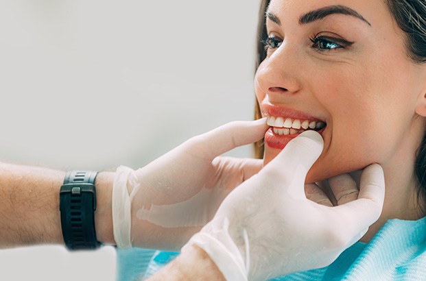 Dentist examining a woman’s teeth