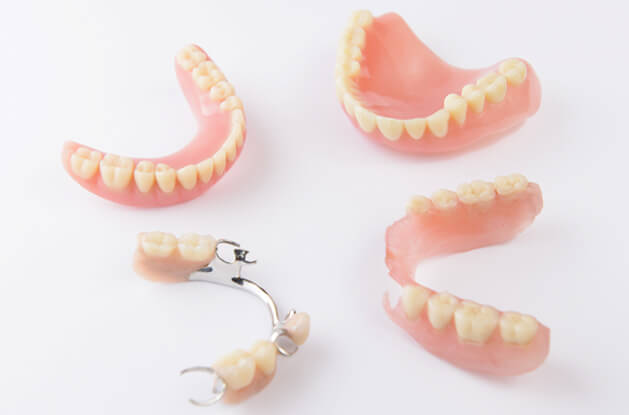 various dentures on a table