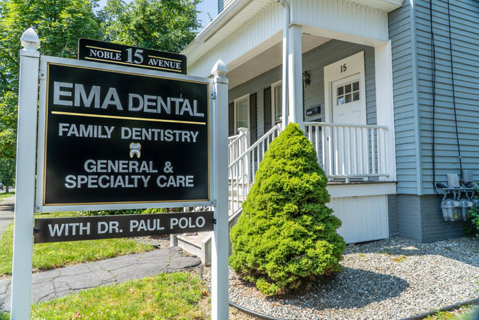 Sign reading E M A Dental Family Dentistry General and Specialty Care with Doctor Paul Polo