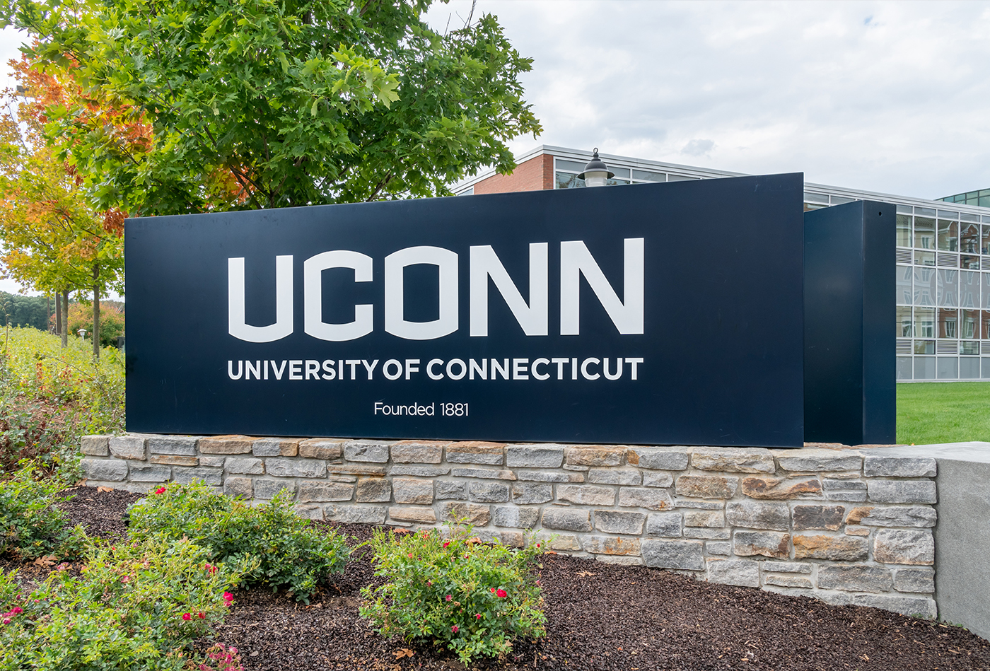 Outdoor sign reading U C O N N University of Connecticut Founded 1881