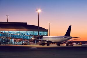 An airplane at the gate ready to take passengers